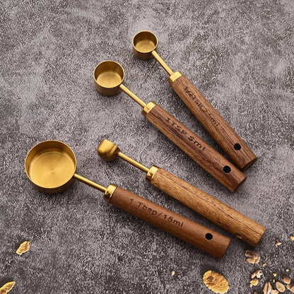 Gold Stainless Steel Measuring Spoon Set with Wooden Handles – 4 Pieces